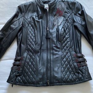 Ladies genuine leather riding jacket.